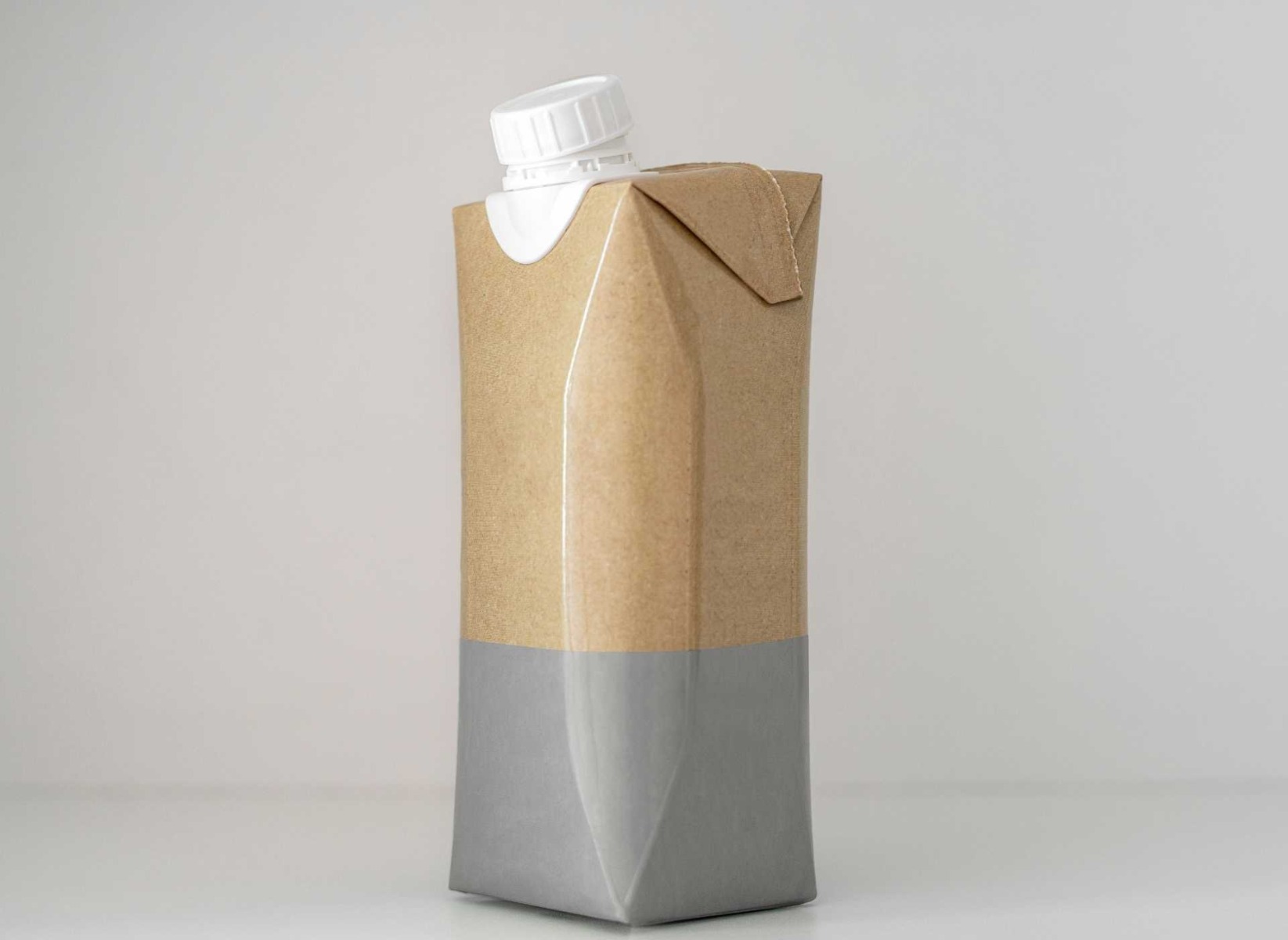 Sustainable packaging of a paper bottle